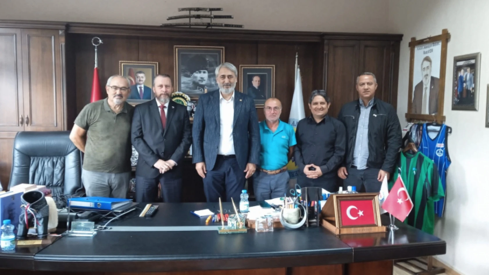 Başkan Murat Aydın , Curling ailesini makamında ağırladı