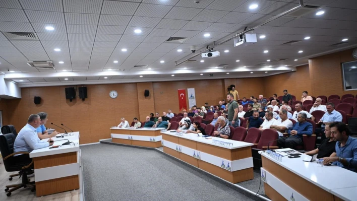 Kocaman'dan muhtarlara: 'Uyum ve ahenkle çalışıyoruz'